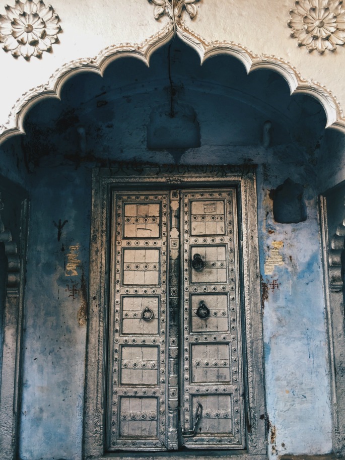 Most doors in rural India are freshly painted regularly with unique color combinations. Blue is used often, especially in hot regions, as a respite from the heat. 