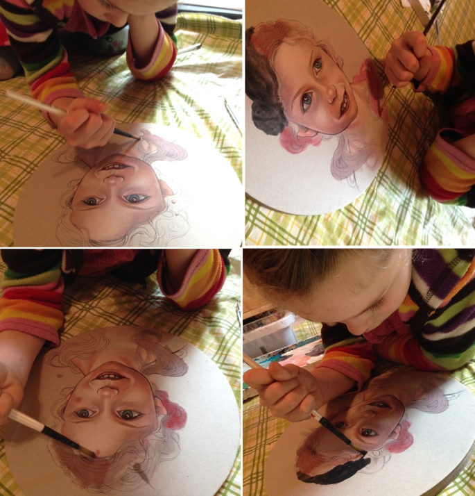 Drawing and painting with her daughter, Myla.